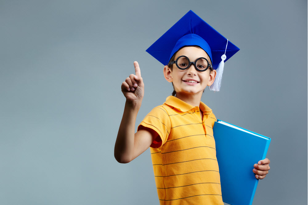 proud-little-boy-with-glasses-graduation-cap.jpg